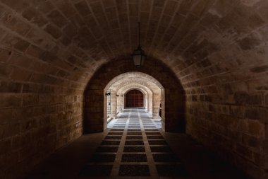 Almudaina and Mallorca Cathedral tunnel arches clipart