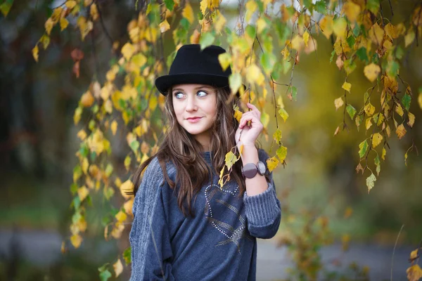 Beautiful girl in a hat — Stock Photo, Image