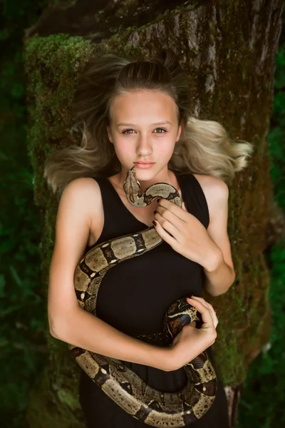 Beautiful young girl with snake — Stock Photo, Image