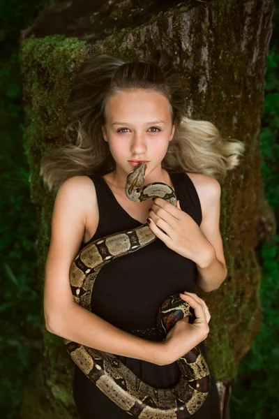 Beautiful young girl with snake — Stock Photo, Image