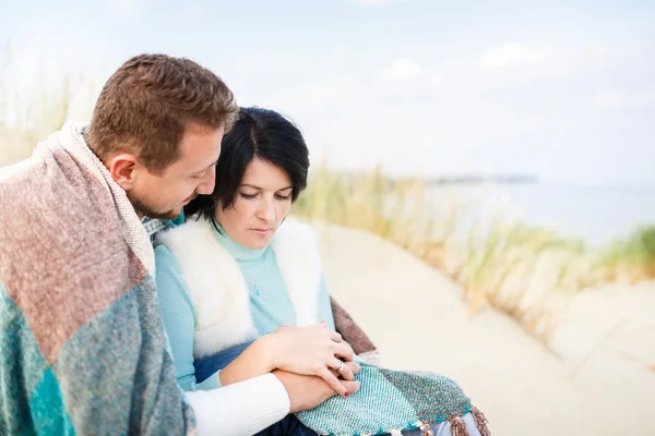 Happy couple in a dune — Stock Photo, Image