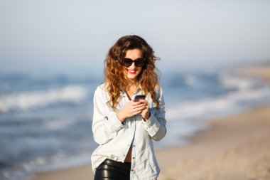 Woman sending an SMS