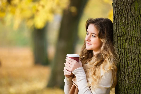 Teenage girl with cup of coffee — Stock Photo, Image