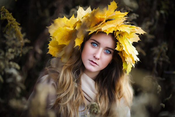 Portrait of a young girl in fall
