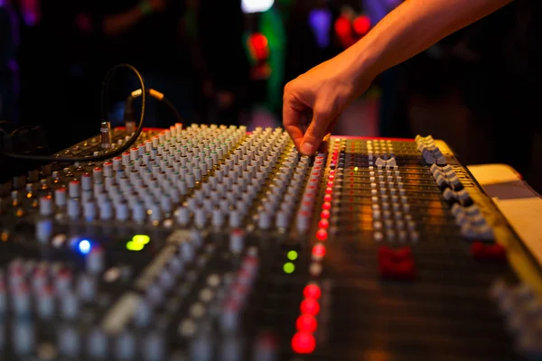 Hand of soundman on the console — Stock Photo, Image