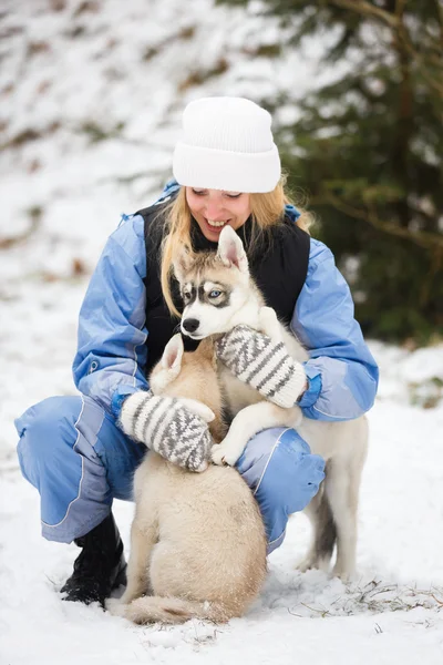 Woman with two puppy — Stock Photo, Image