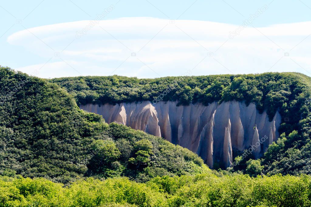 Pumice rock outcrops near river. Kutkhins baht, Kronotsky Reserve, Kamchatka, Russia