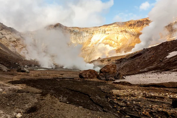 Volcanic landscape. Steaming, sulfuric, active fumaroles near Volcano Mutnovsky, Kamchatka Peninsula, Russia