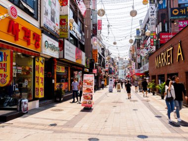 Suwon, South Korea - June 14, 2017: People walking along the main street in Suwon.