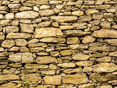 Eski duvar arkaplanı, taş ustalığının bir parçası.