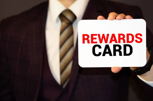 Businessman Putting Card Text Reward Performance Pocket — Stock Photo, Image