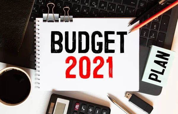 Finance, Business and Economy Concept - 2021 BUDGET text written on notepad. Stock photo