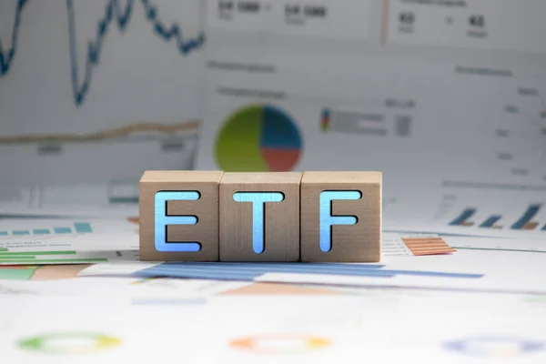 ETF or Exchange Traded Fund text on black block.