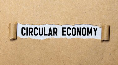 Gri bir kağıt üzerinde dairesel ekonomi metni