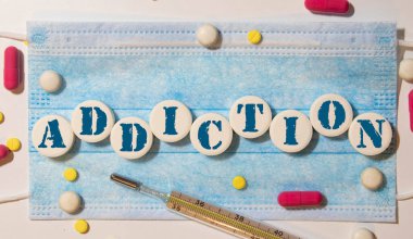 Yapı taşları ve konsept ile yapılan ADDICTION kelimesi