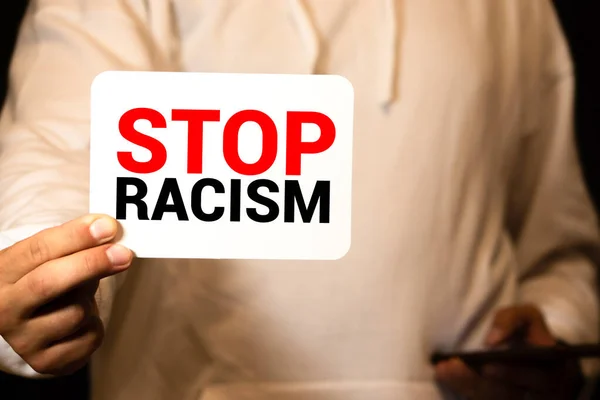 Man Holding Cardboard Banner Stop Racism Message — Stock Photo, Image