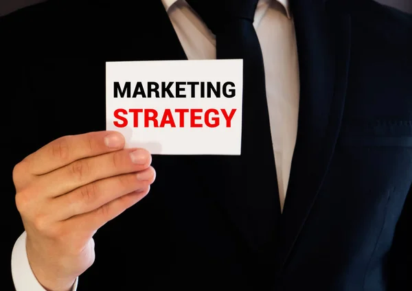 Pengusaha Memegang Strategi Pemasaran Tanda Konsep — Stok Foto