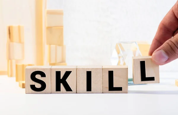 SKILLS word on wooden blocks, business concept
