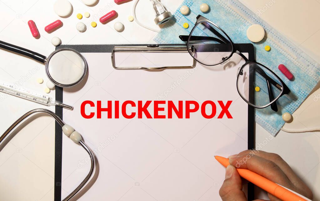 Word Chickenpox on white paper. Medical concept.