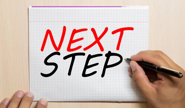 Next step text written on a diary