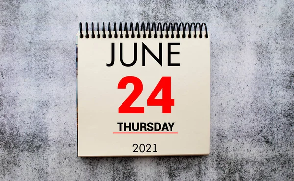 Save the Date written on a calendar - June 24.