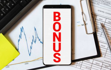 Hesap makinesindeki yapı taşlarıyla yapılmış BONUS sözcüğü.
