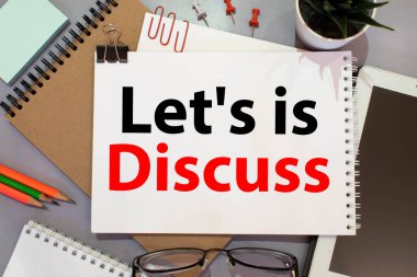 Let 's is Discuss harflerini gösteren bir not yazılıyor. İş fotoğrafı gösterimi. Konuşmaya başlamayı öneriyorlar.