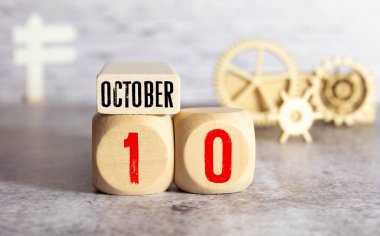 10 Ekim. 10 Ekim. Eski ahşap özgeçmiş üzerine ahşap takvim. Metnin için metin günü..