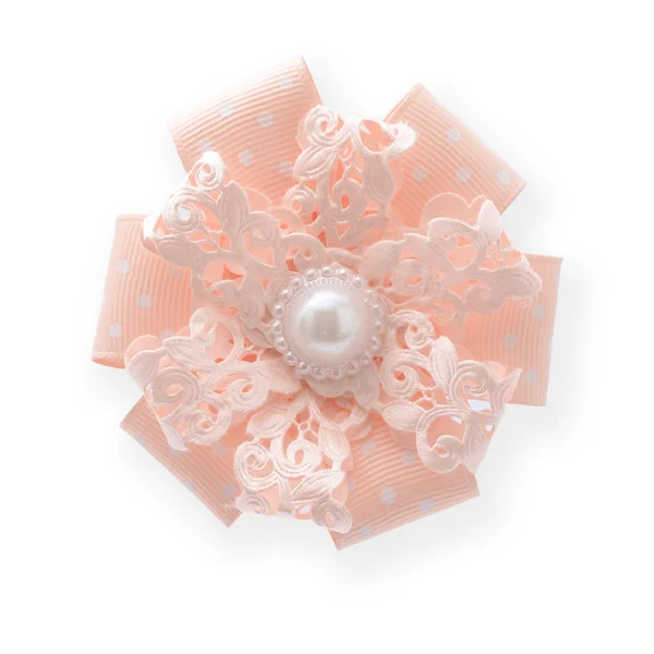 Pink bow with pearl  isolated Stock Image