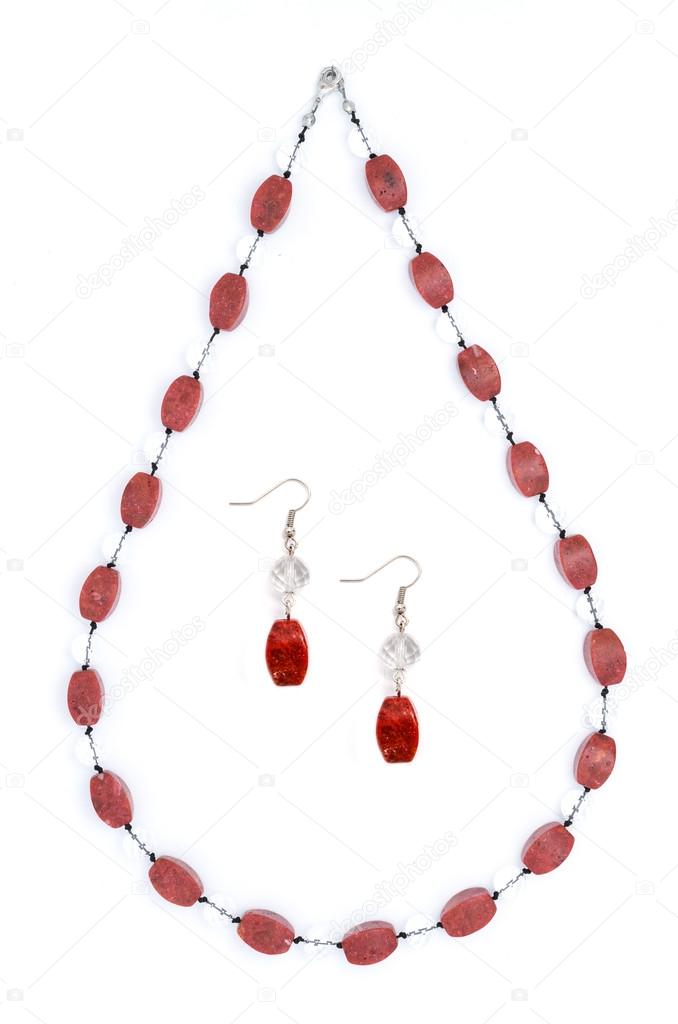 red necklace and earrings isolated