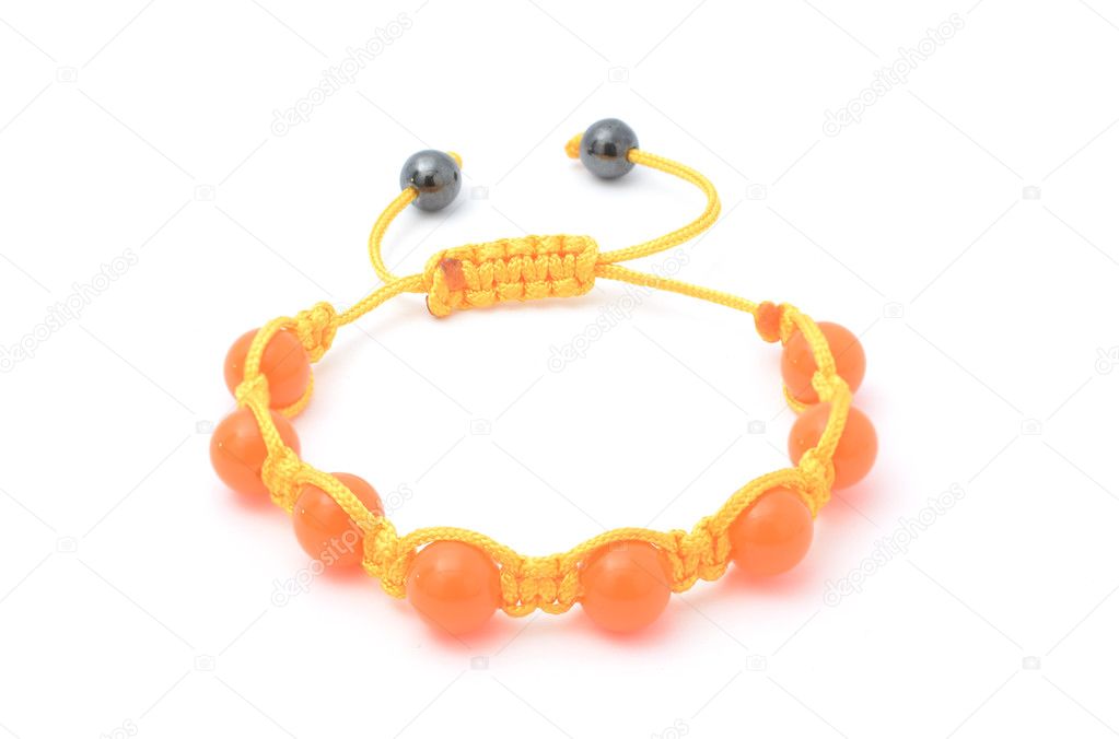 Bracelet with orange beads isolated