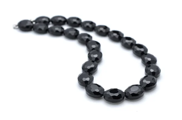 Necklace with black stones isolated — Stock Photo, Image