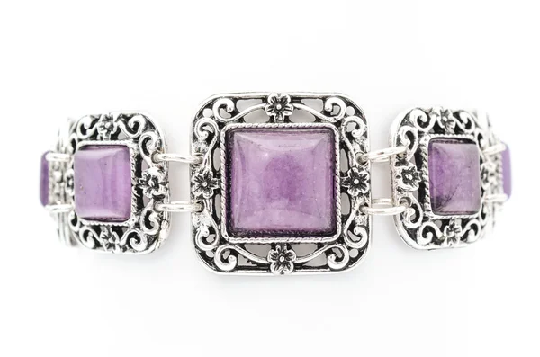 Bracelet with purple stones isolated on white