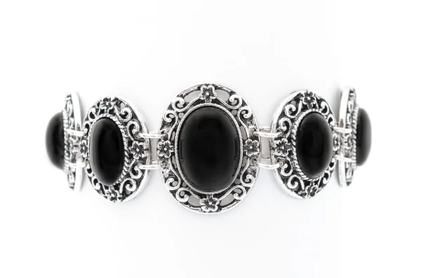 Bracelet with black stones isolated on white — Stock Photo, Image