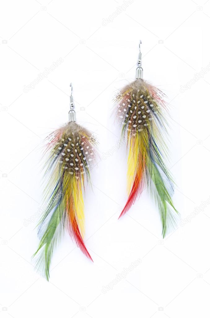 earrings made of feathers on a white background