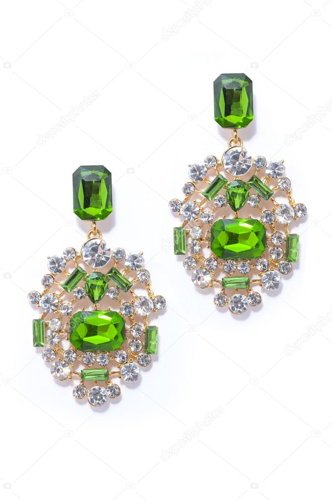 emerald earrings on a white background
