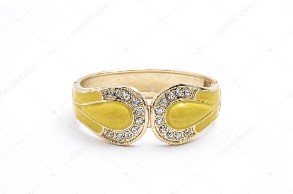 yellow bracelet with diamonds on a white background