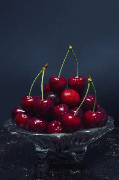 Cherries in a saucer — Stock Photo, Image