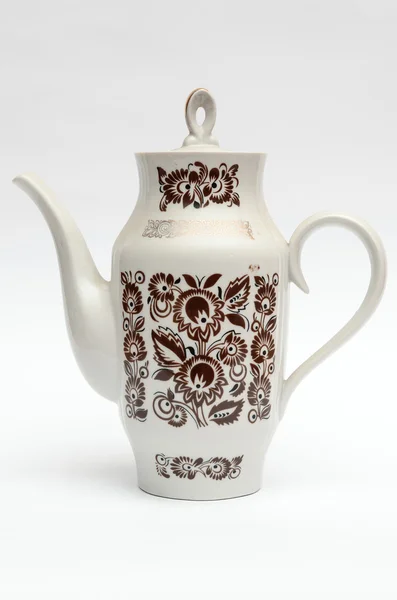 Teekanne mit Muster auf weißem Hintergrund — Stockfoto
