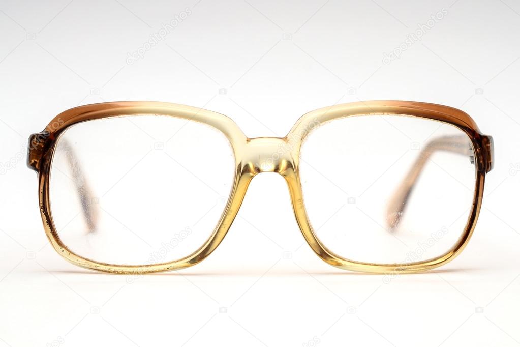 old glasses on a white background