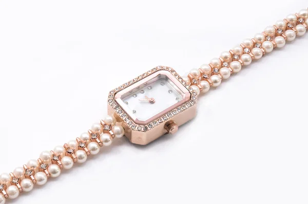 Women wristwatches  with pearls on a white background — Stock Photo, Image