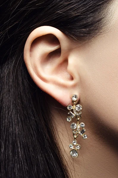 Ear with earring — Stock Photo, Image