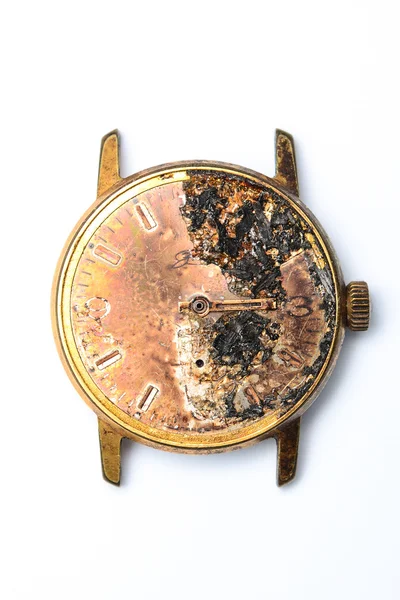 stock image burned wristwatch on white background