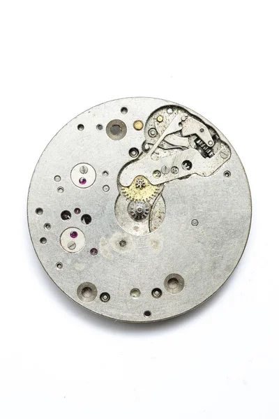 El mecanismo del reloj sobre un fondo blanco — Foto de Stock