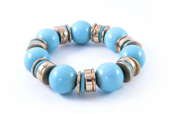 Bracelet avec pierres bleues isolées sur blanc — Photo