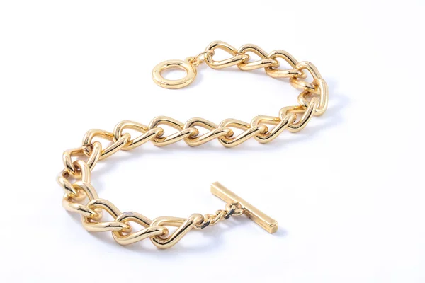 Pulsera de oro grueso aislado en blanco — Foto de Stock