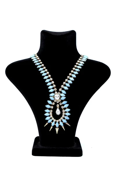 Necklace with blue stones on a mannequin isolated on white — Stock Photo, Image