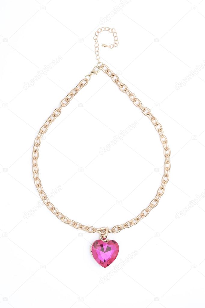 Pendant with pink heart  isolated on white