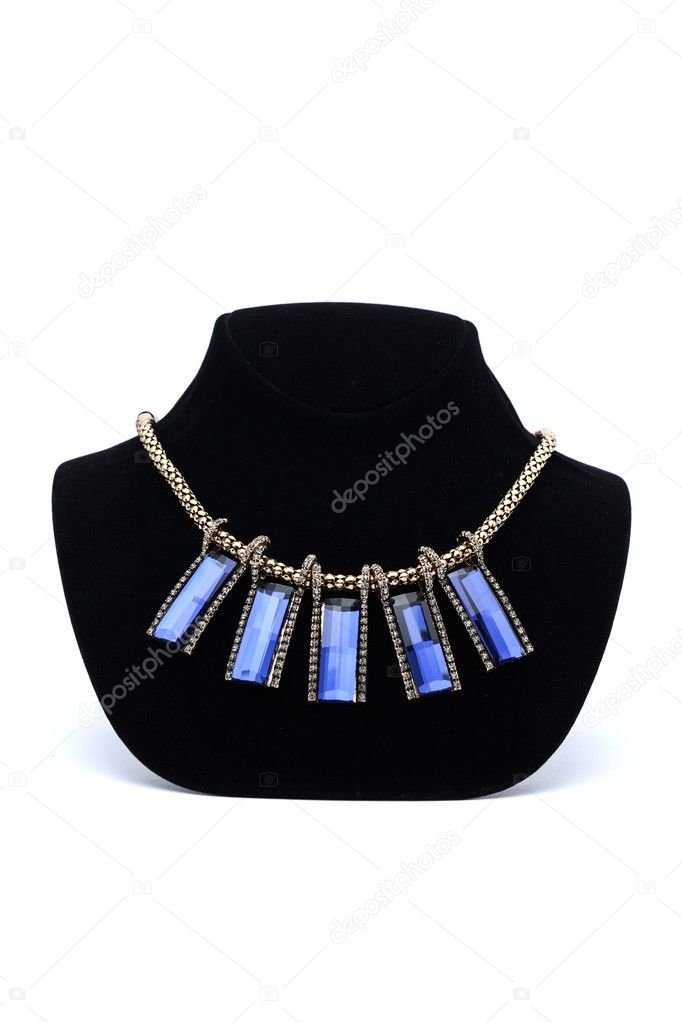 Necklace with blue gems on a mannequin