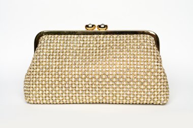 Beyaz zemin üzerine Pırlantalı altın debriyaj